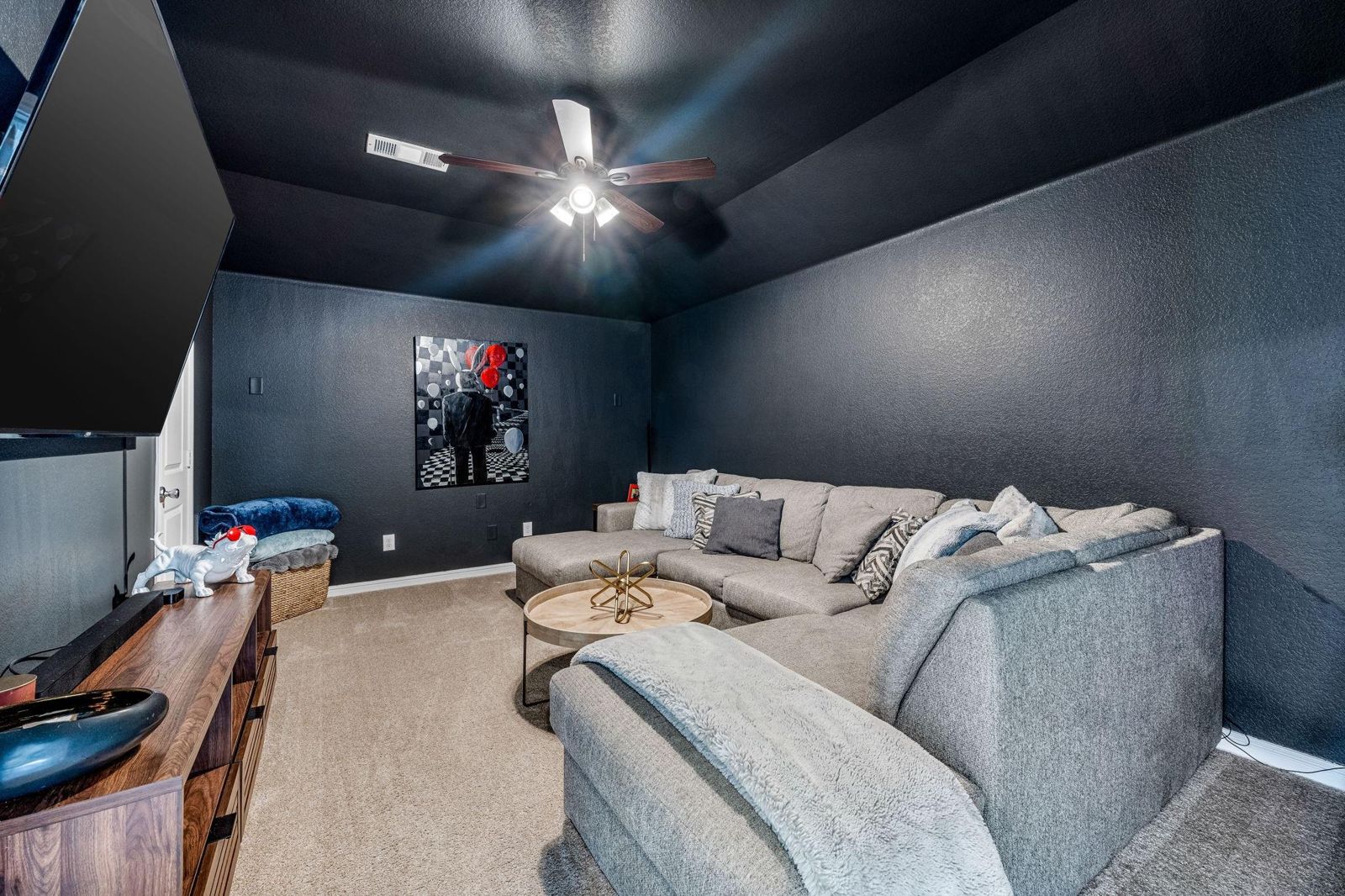Staged media room with sectional, Fort Worth