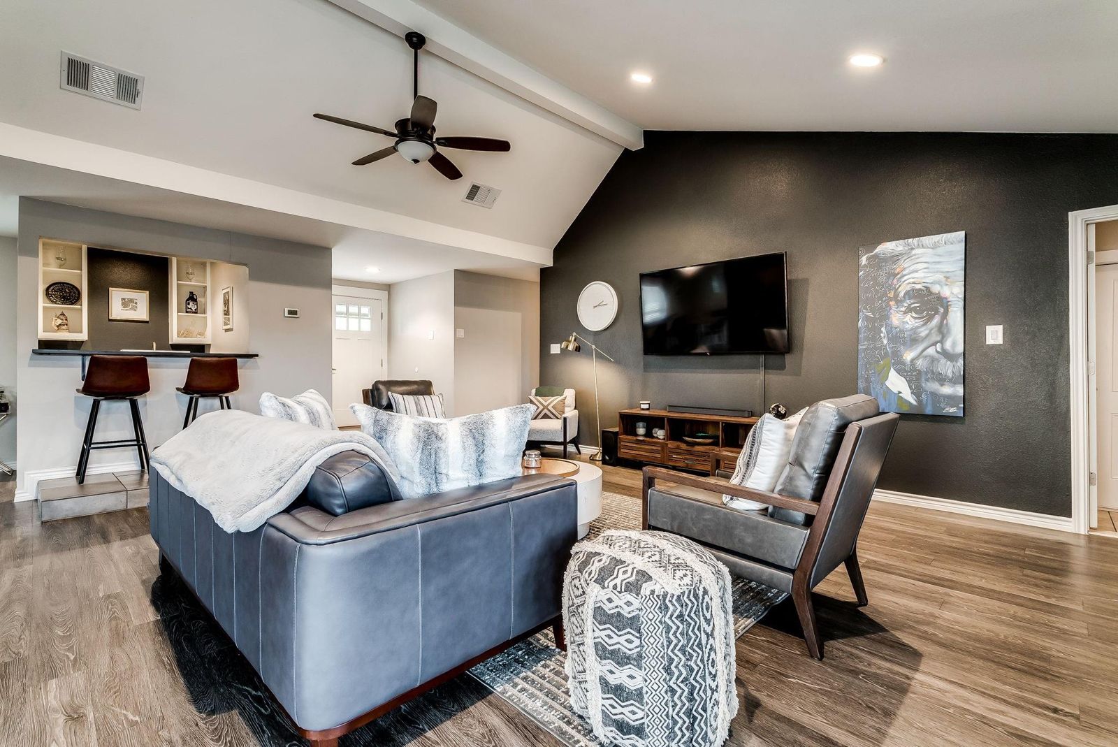 Staged living room with stone fireplace, Richardson