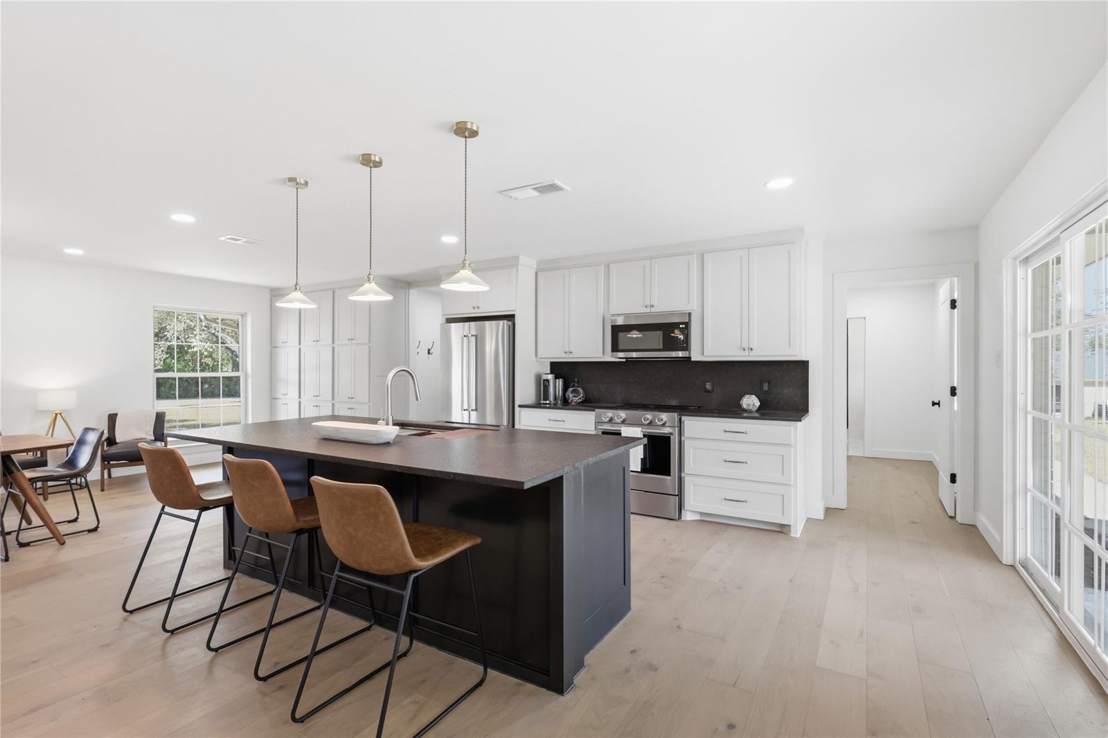 Staged kitchen with island seating, Willow Park