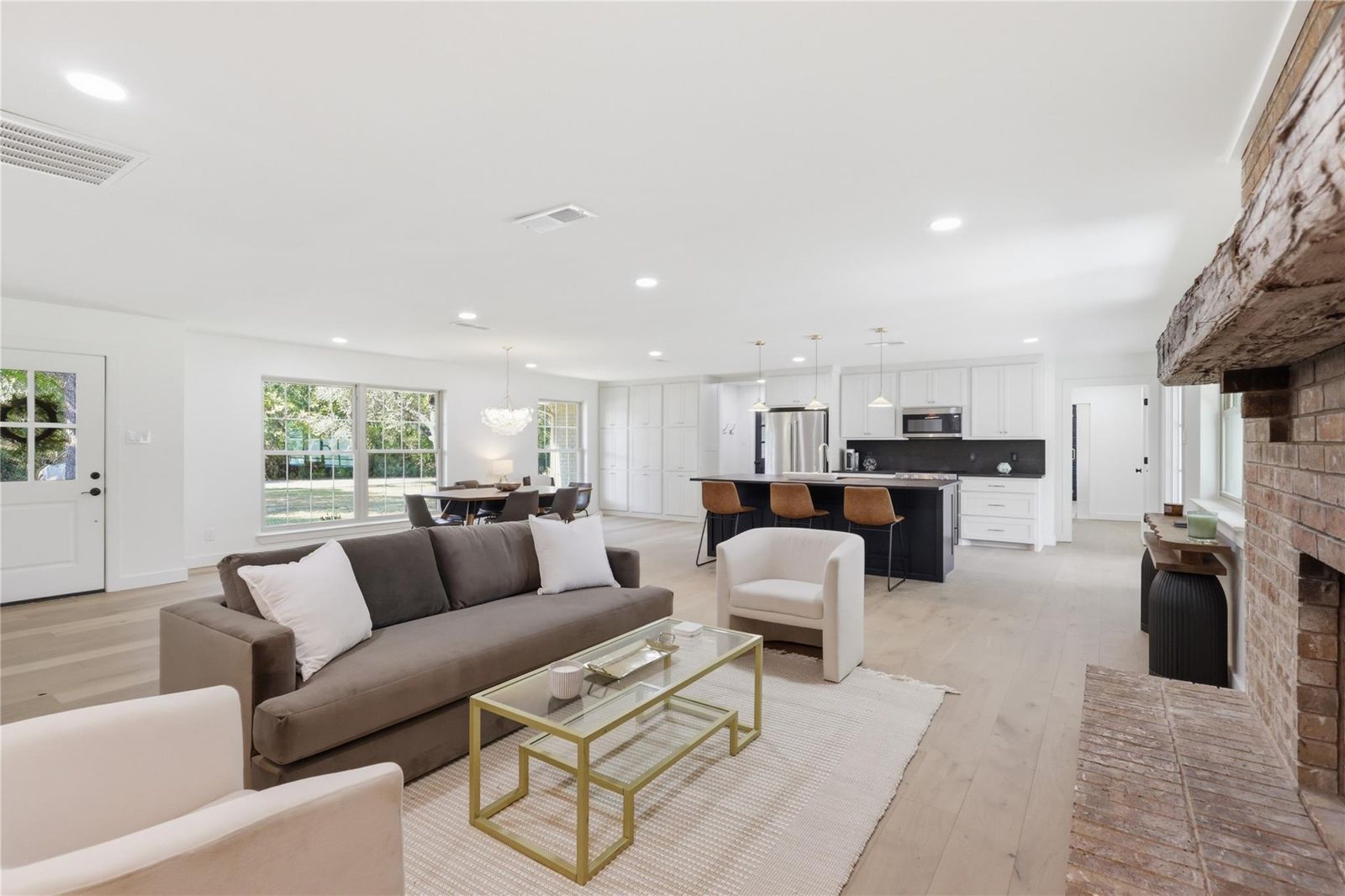 Staged living room with neutral sofas, Willow Park